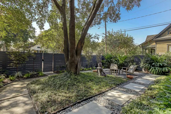 a backyard of a house with lots of green space