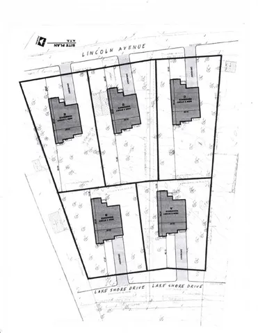 a view of a yard with a large trees