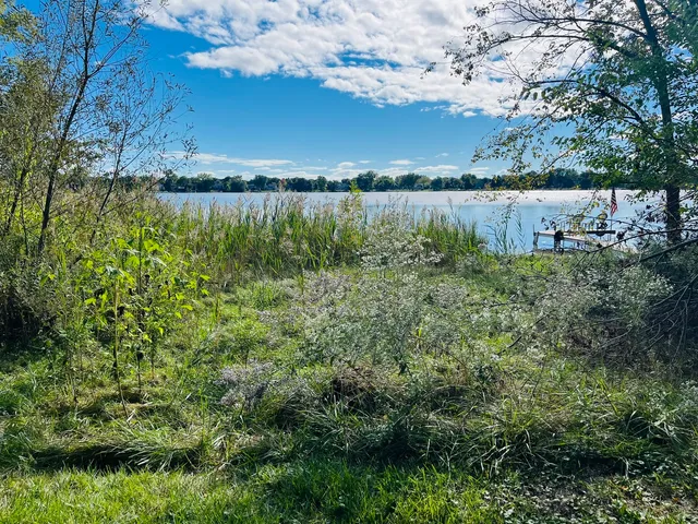 a view of a lake with outdoor space