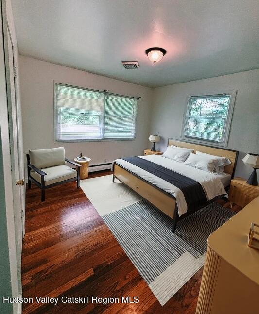 124 Blue Mountain Road Saugerties, NY 12477 - Photo 5 of 14 a bedroom with a bed and a window