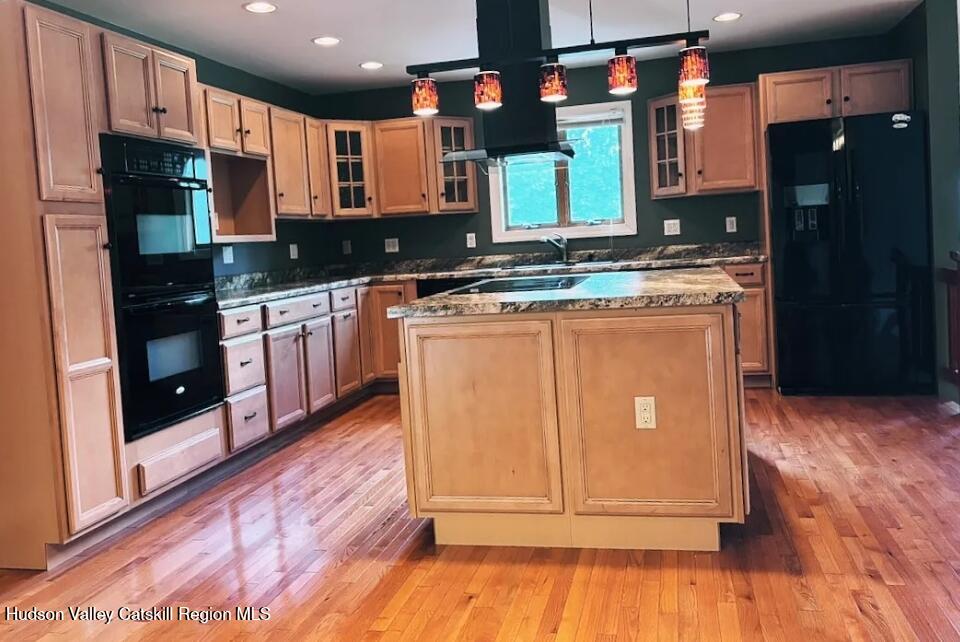 124 Blue Mountain Road Saugerties, NY 12477 - Photo 8 of 14 a kitchen with stainless steel appliances granite countertop a refrigerator a stove a sink and a microwave