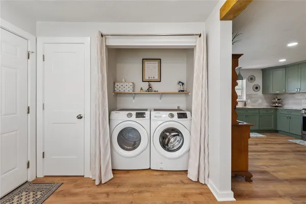 a view of kitchen and washer and dryer