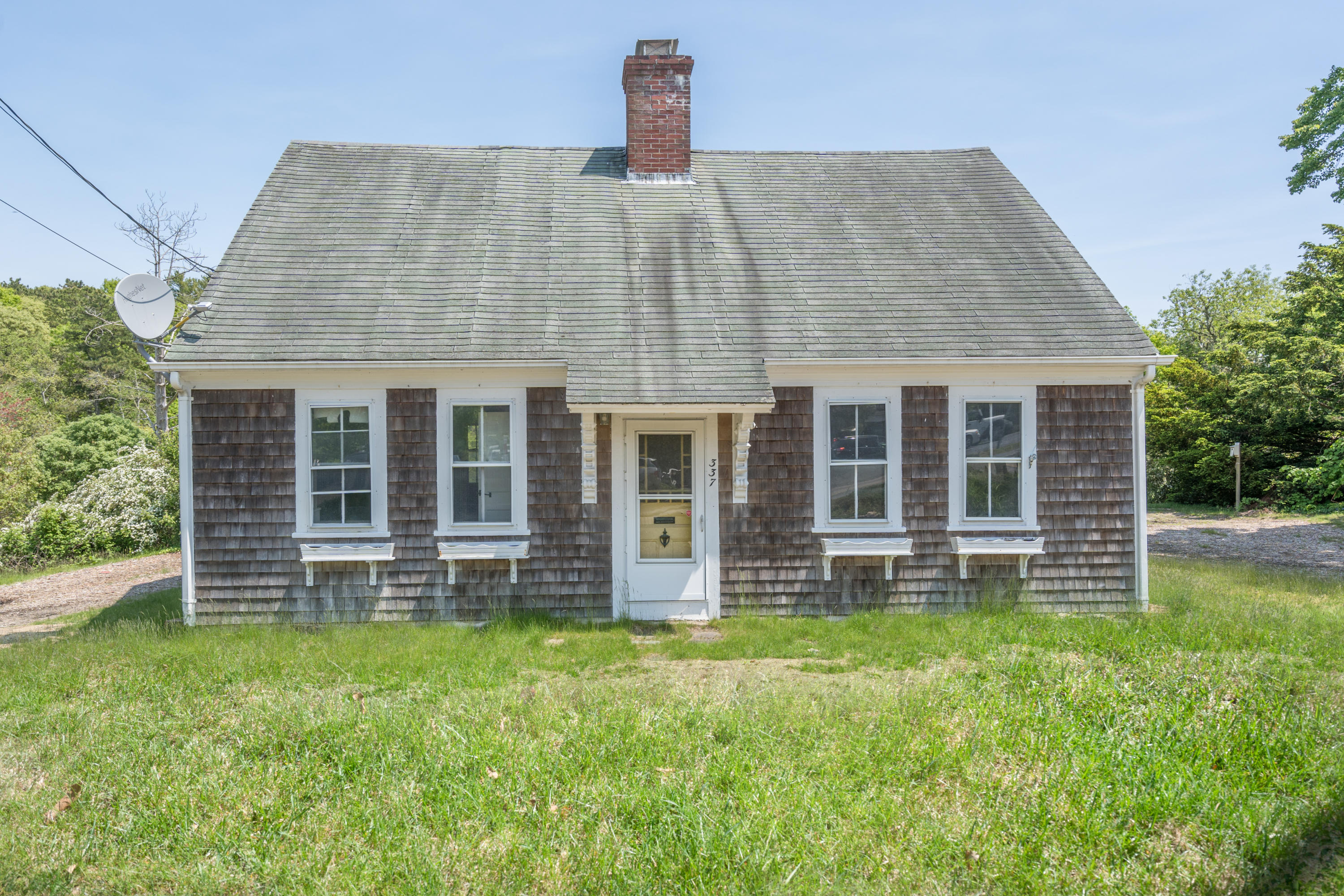 337 South Main Street Centerville, MA 02632 - Photo 19 of 19 a view of a house with a yard