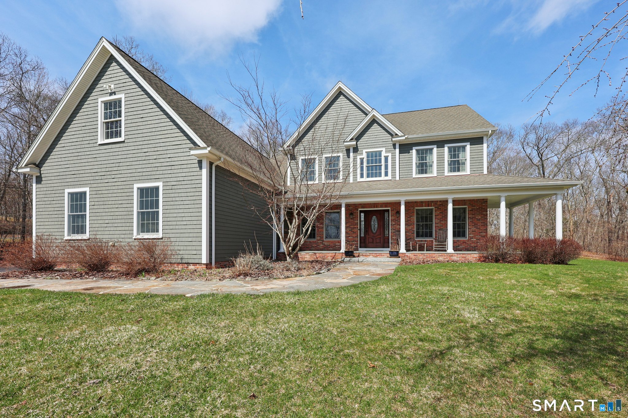 15 Mains Way Preston, CT 06365 - Photo 1 of 40 a front view of a house with a yard