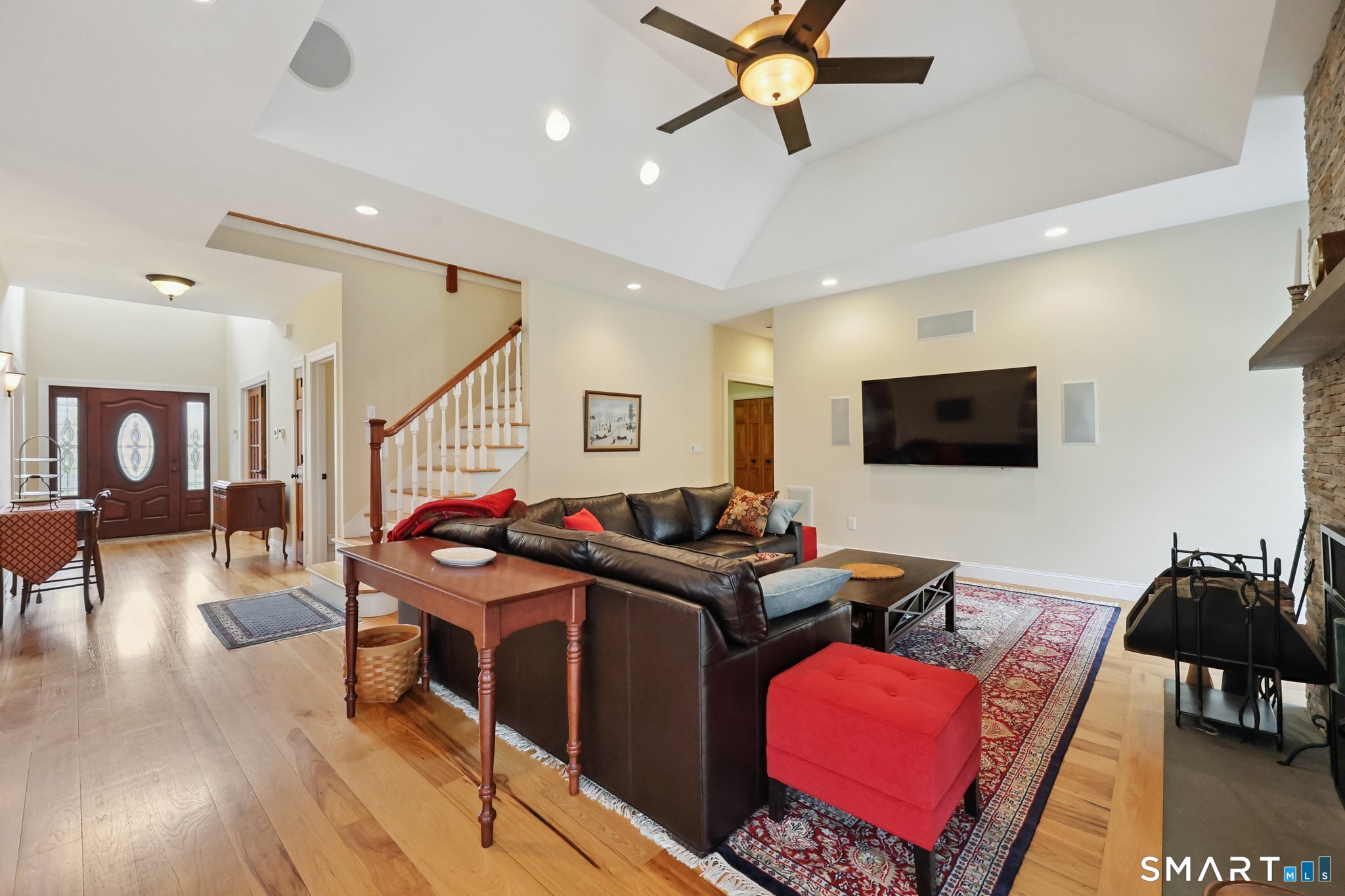 15 Mains Way Preston, CT 06365 - Photo 11 of 40 a living room with furniture and a flat screen tv