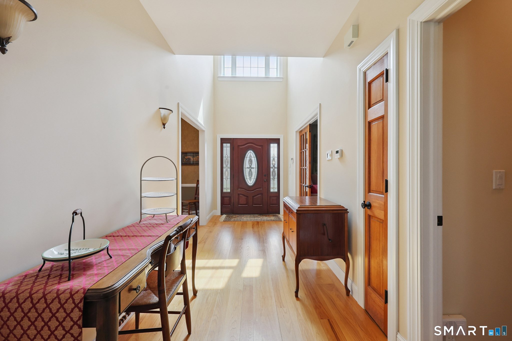 15 Mains Way Preston, CT 06365 - Photo 15 of 40 a view of a dining room with furniture and wooden floor
