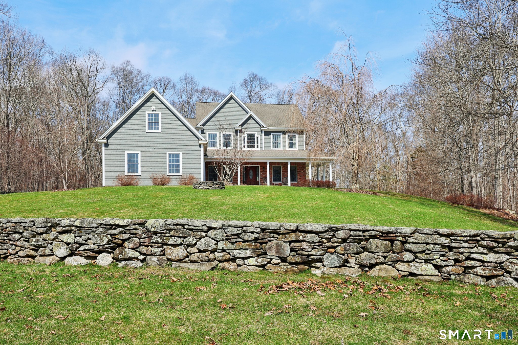 15 Mains Way Preston, CT 06365 - Photo 2 of 40 a front view of a house with a garden