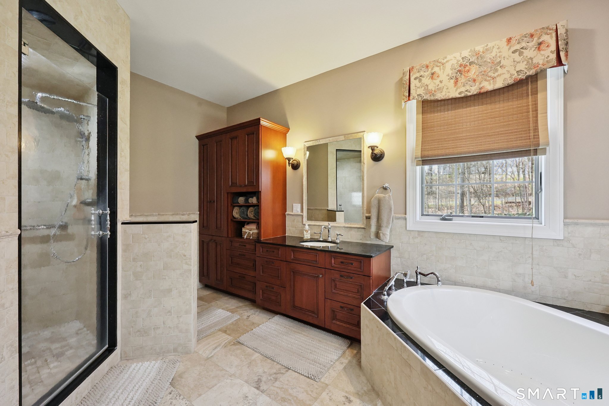 15 Mains Way Preston, CT 06365 - Photo 21 of 40 a bathroom with a tub sink and mirror