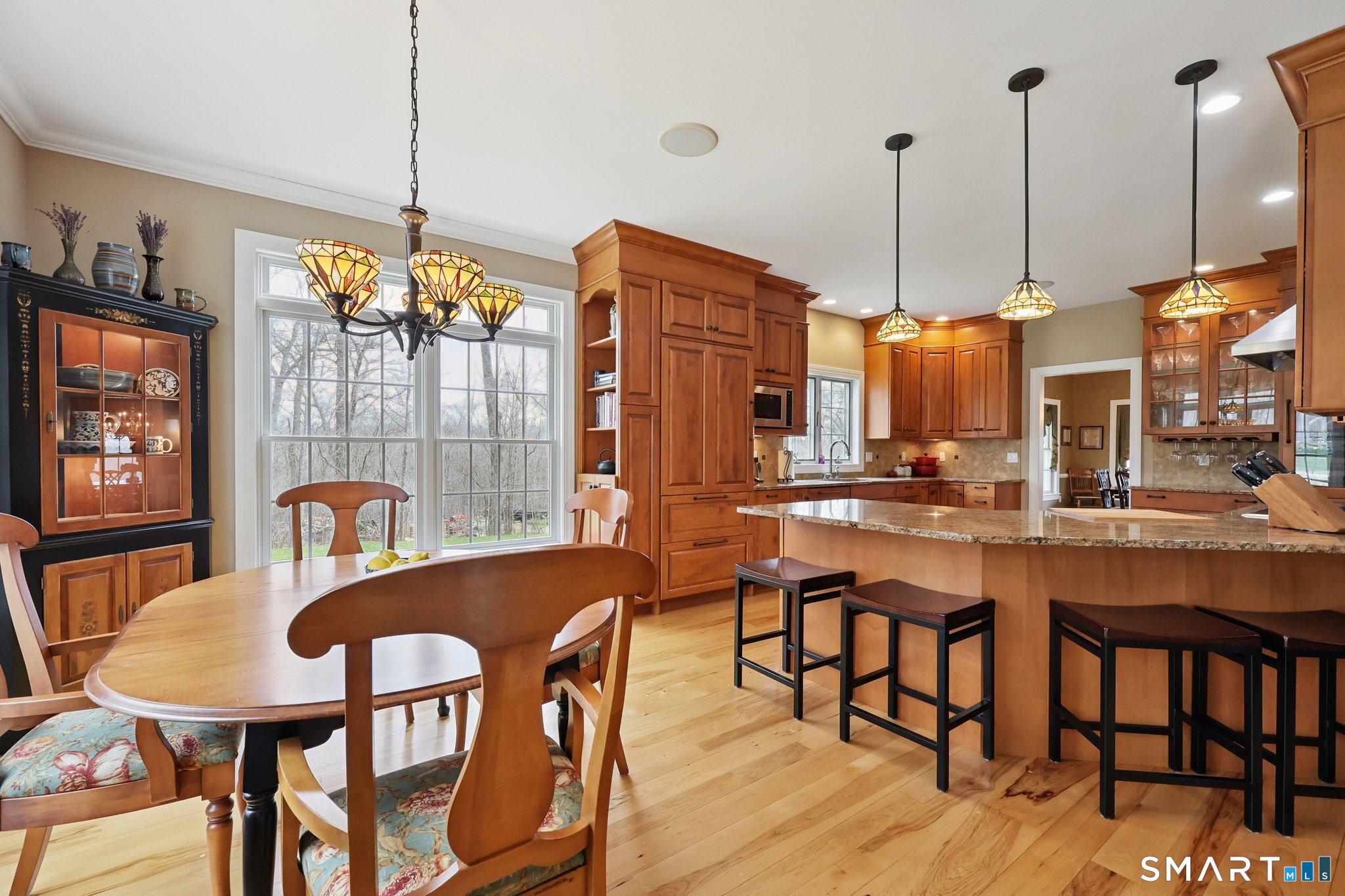 15 Mains Way Preston, CT 06365 - Photo 4 of 40 a dining table with chairs and window