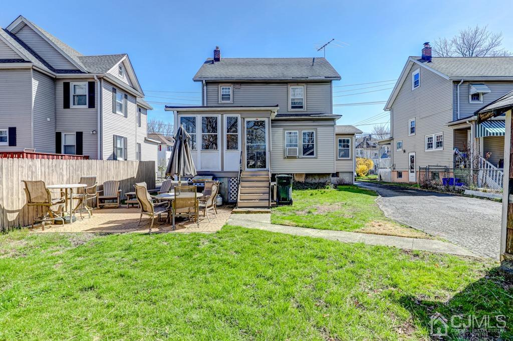 154 New Market Road Dunellen, NJ 08812 - Photo 2 of 31 a view of a house with sitting area and sitting area