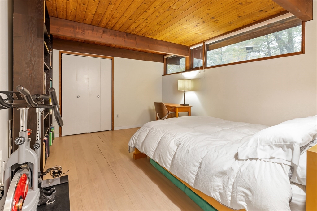 134 Rangeley Road Brookline, MA 02467 - Photo 15 of 20 a bedroom with a bed and a view of bathroom