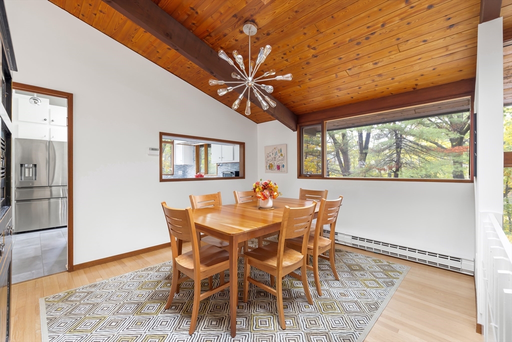 134 Rangeley Road Brookline, MA 02467 - Photo 6 of 20 a view of a dining room with furniture window and outside view