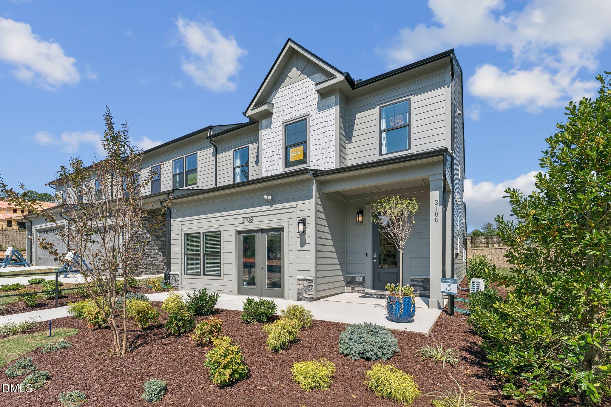 2112 Barrier Ridge Way Apex, NC 27502 - Photo 27 of 36 front view of a house with a yard