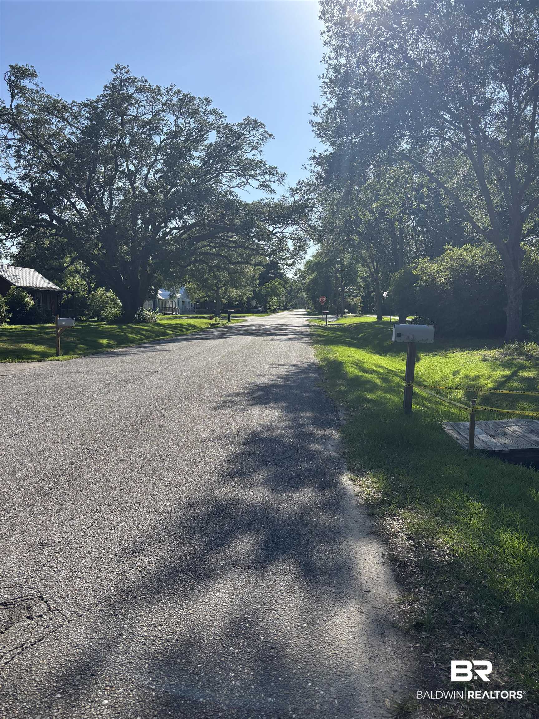216 West Orange Avenue Foley, AL 36535 - Photo 9 of 37 View of asphalt street with traffic signs