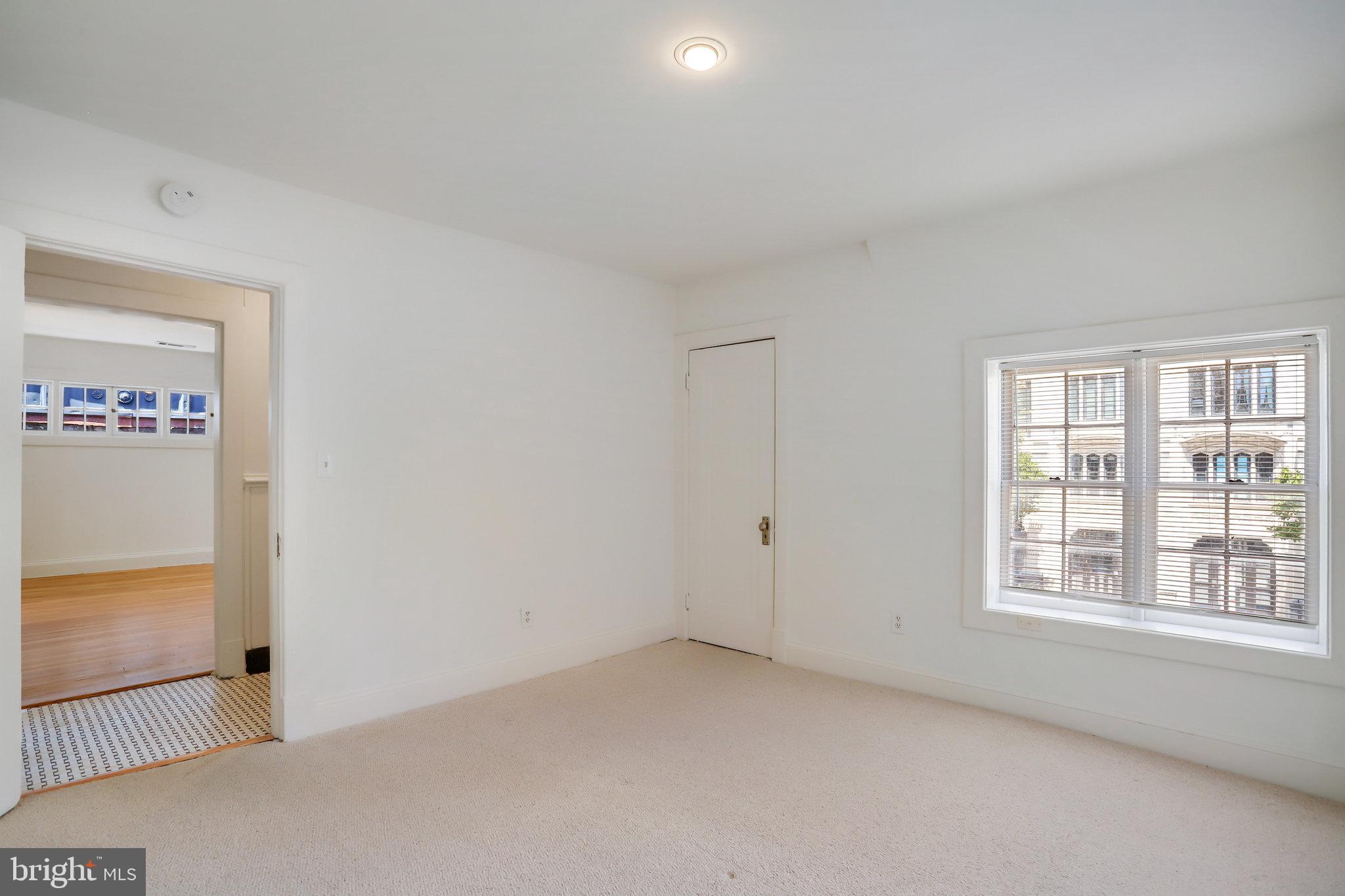 1633 16th Street Northwest Washington, DC 20009 - Photo 113 of 130 an empty room with windows