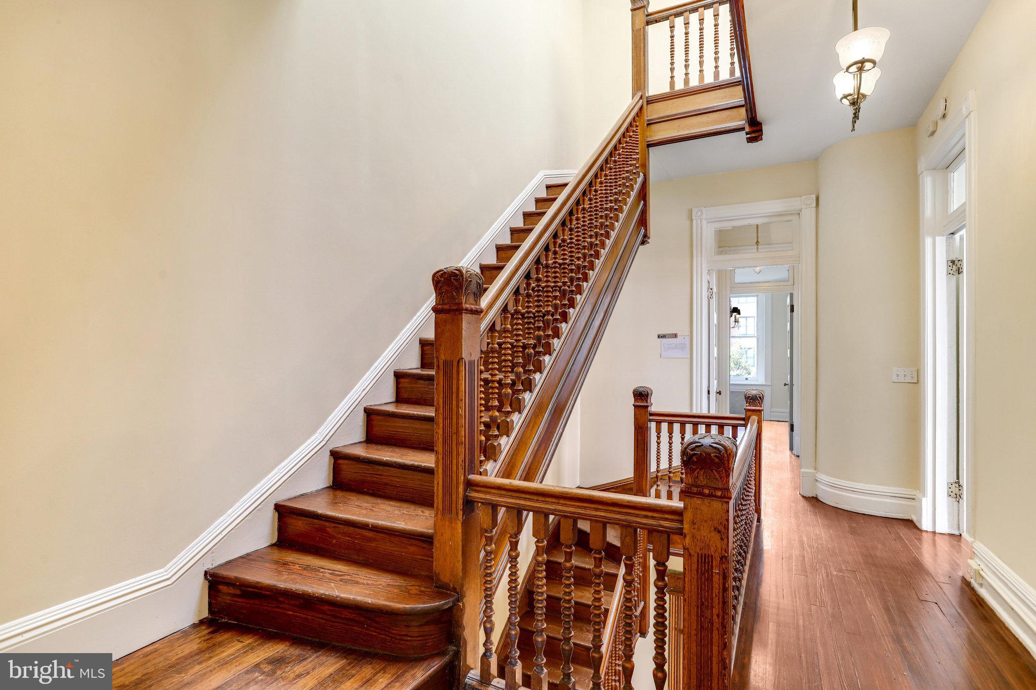 1633 16th Street Northwest Washington, DC 20009 - Photo 85 of 130 a view of entryway with wooden floor and stairs