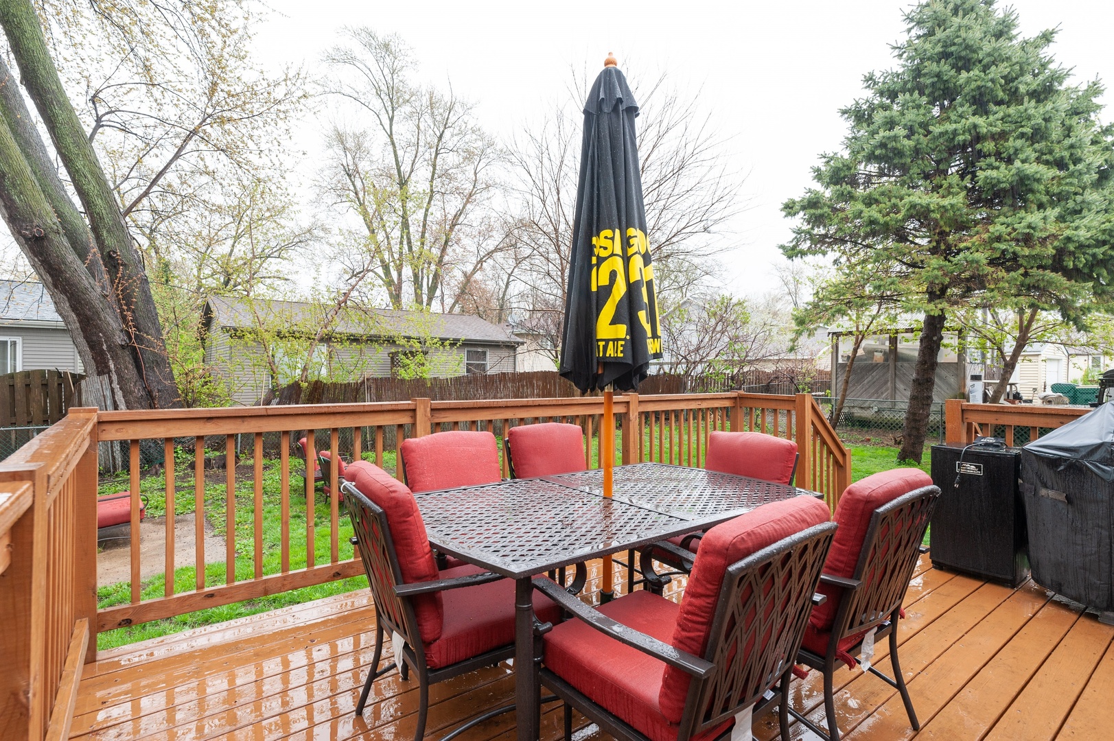 310 Rand Road Lakemoor, IL 60051 - Photo 9 of 10 a view of deck with furniture and trees