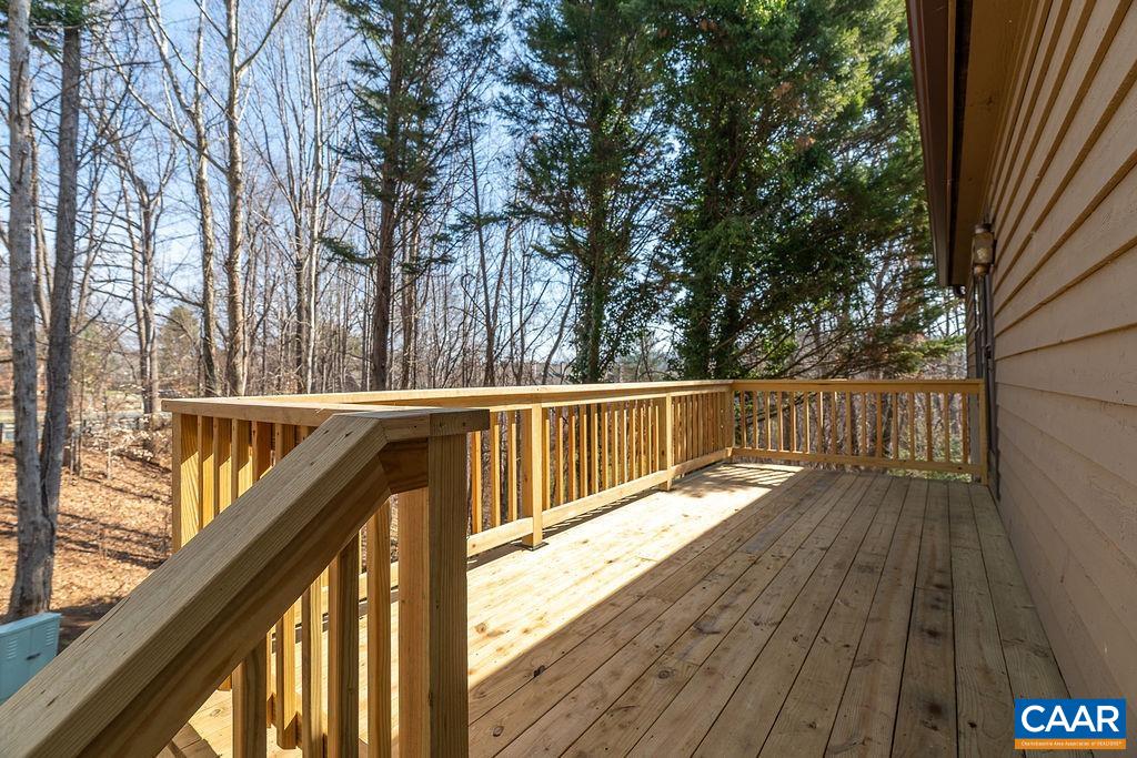 751 Exton Court Charlottesville, VA 22901 - Photo 12 of 42 a view of balcony and deck with wooden floor and fence