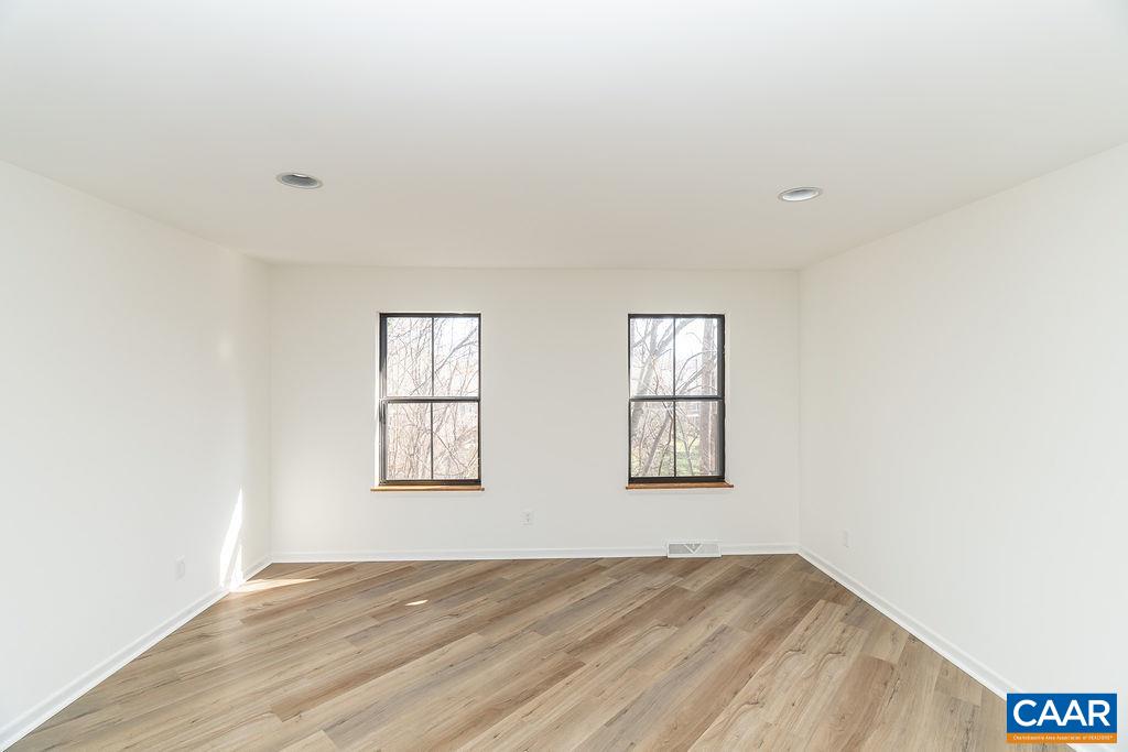 751 Exton Court Charlottesville, VA 22901 - Photo 15 of 42 an empty room with windows