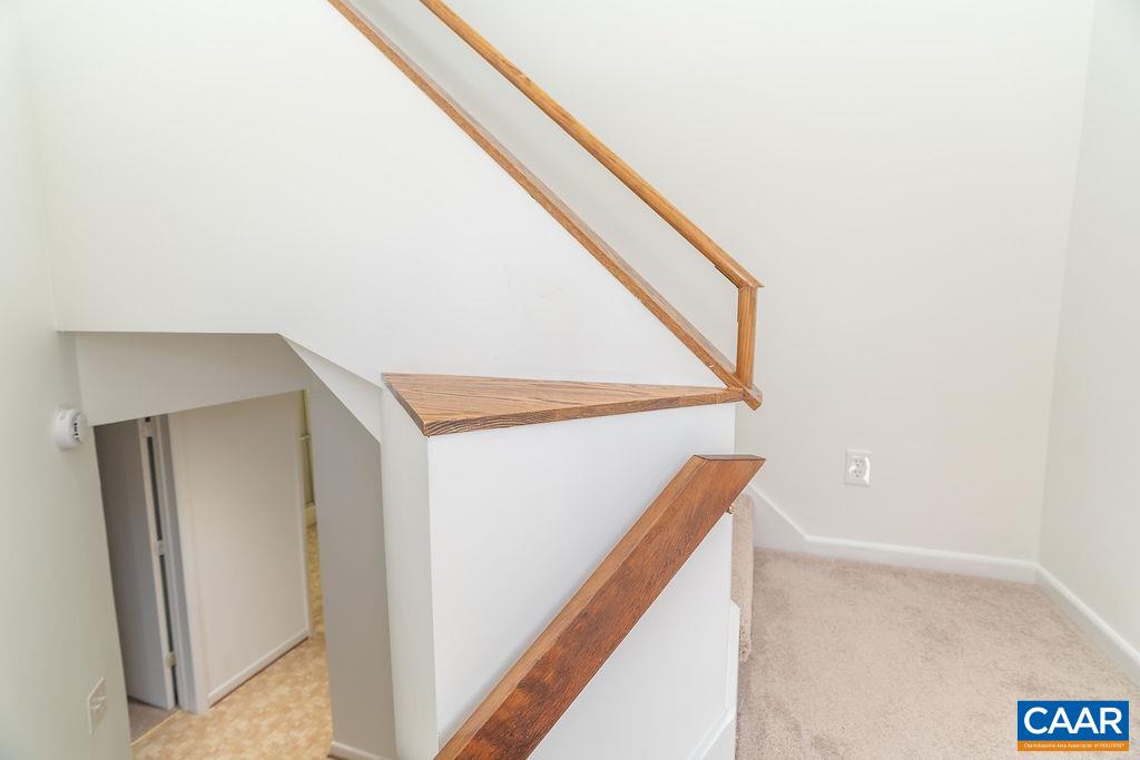 751 Exton Court Charlottesville, VA 22901 - Photo 26 of 42 a view of staircase with white walls and white door