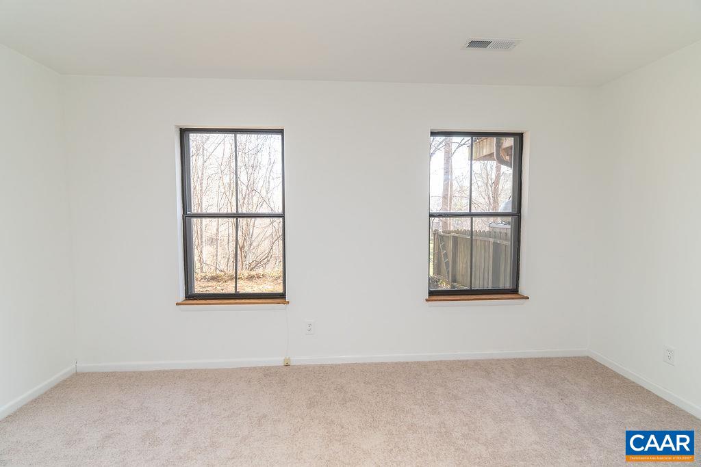 751 Exton Court Charlottesville, VA 22901 - Photo 29 of 42 an empty room with windows