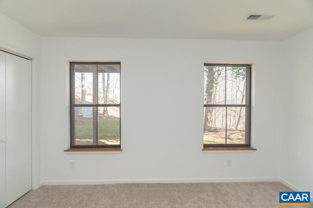 751 Exton Court Charlottesville, VA 22901 - Photo 32 of 42 an empty room with windows