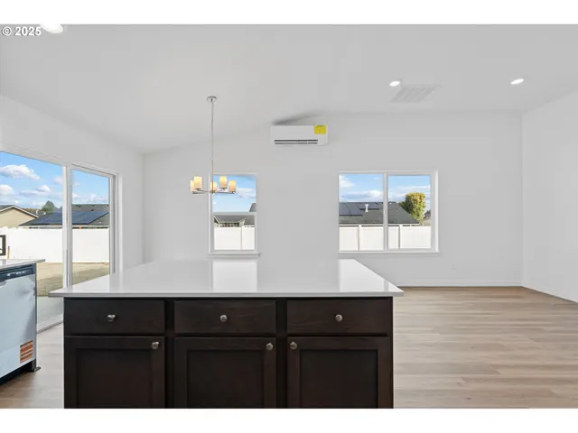 a view of a kitchen from the hallway