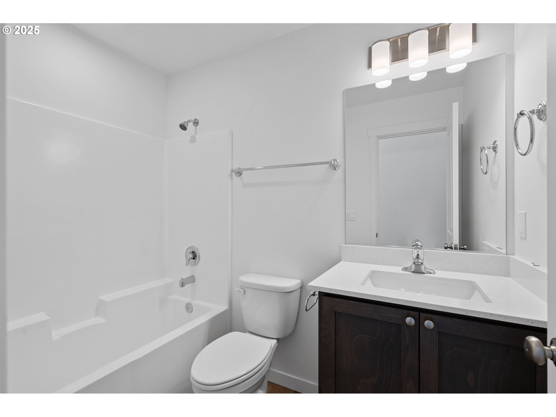 144 Southwest Eagle Drive Boardman, OR 97818 - Photo 16 of 22 a bathroom with a sink a toilet and shower