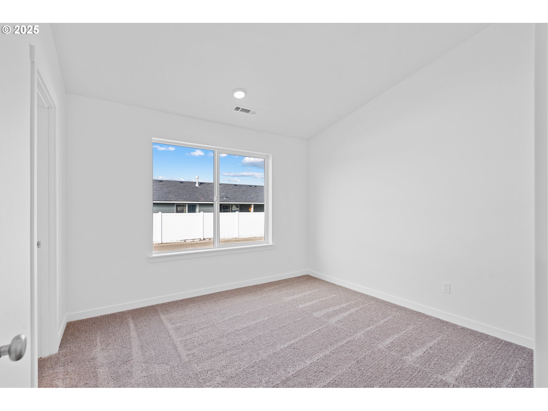 144 Southwest Eagle Drive Boardman, OR 97818 - Photo 19 of 22 a view of an empty room with a window