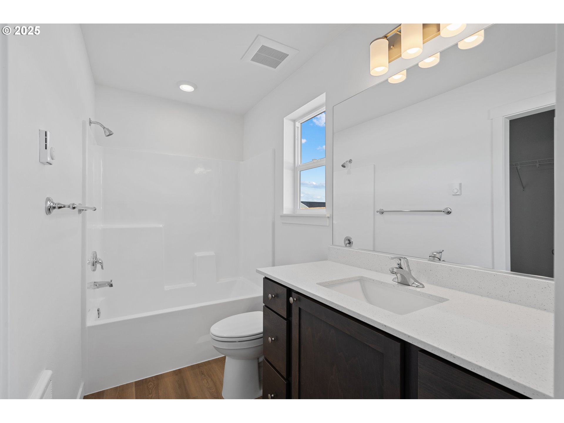 144 Southwest Eagle Drive Boardman, OR 97818 - Photo 21 of 22 a bathroom with a sink a toilet a shower and a mirror