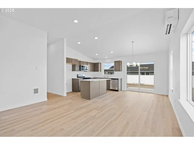 a view of kitchen with wooden floor