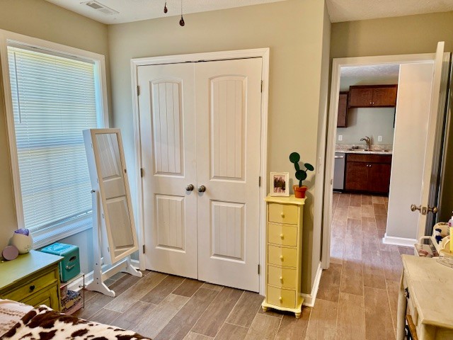 1316 Old Cowan Road Winchester, TN 37398 - Photo 19 of 23 a view of a hallway with wooden floor windows and a livingroom
