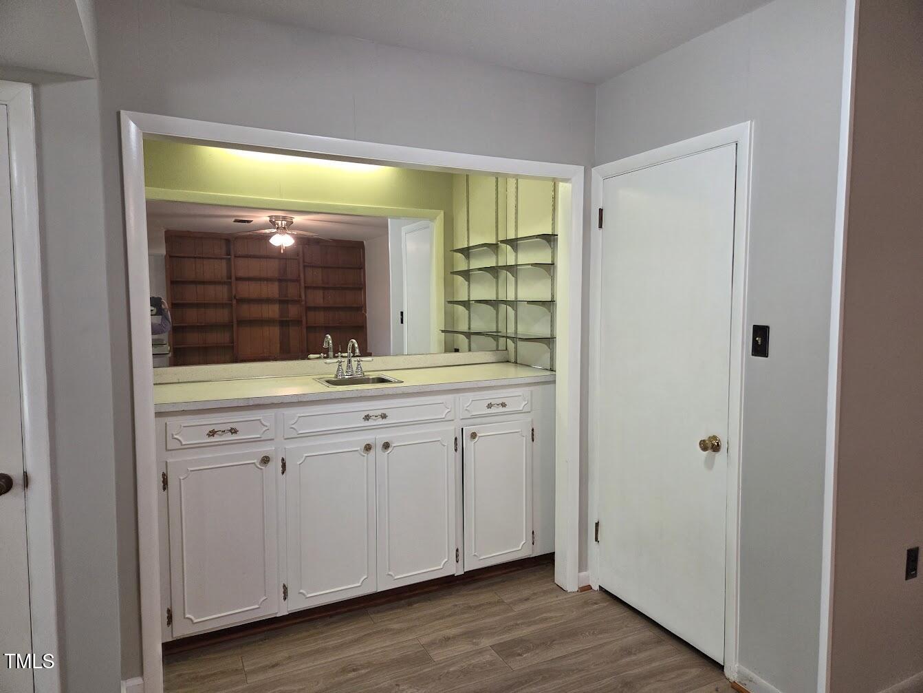 4116 Jane Lane Raleigh, NC 27604 - Photo 22 of 25 a bathroom with a double vanity sink and a mirror