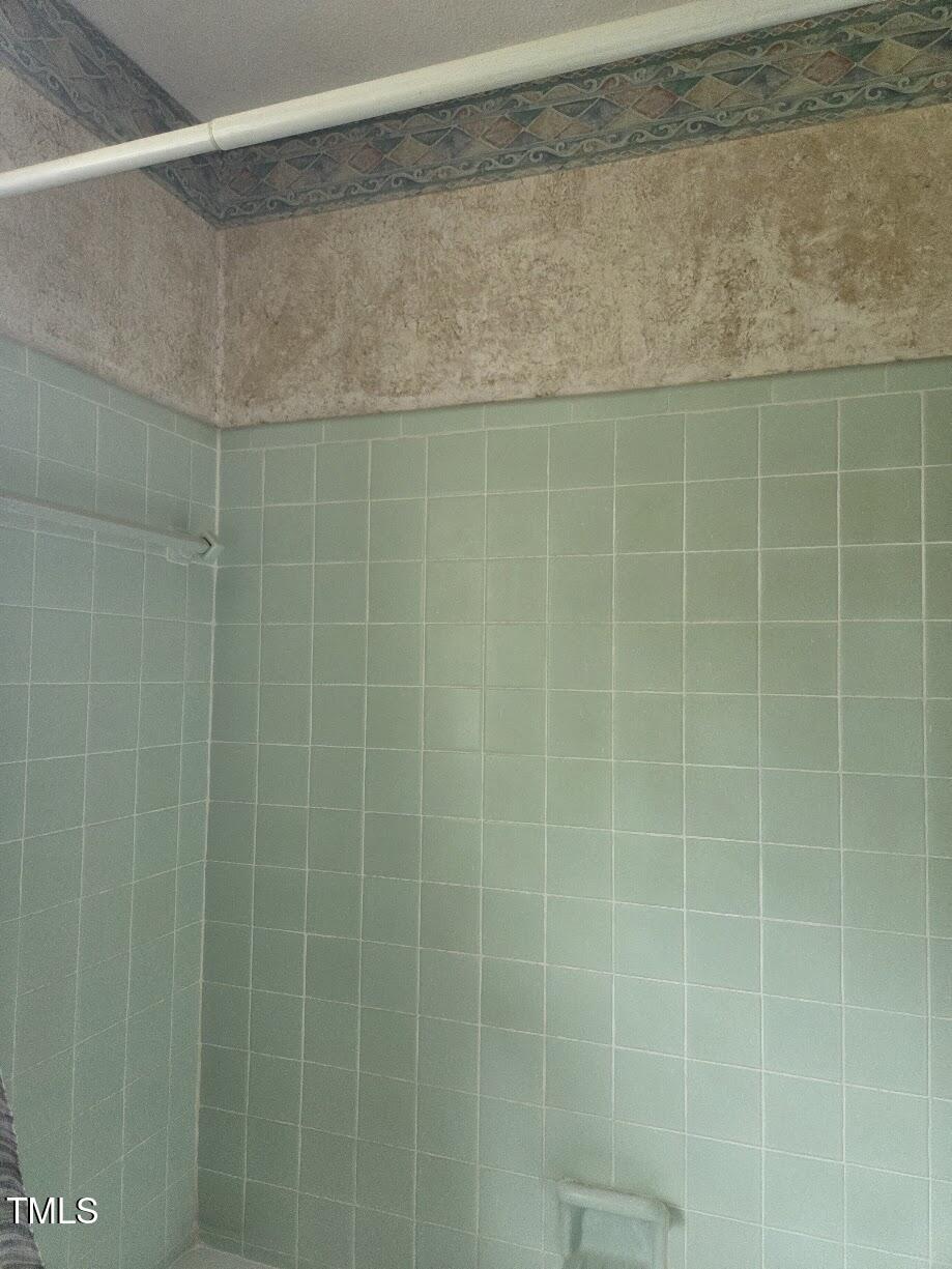 4116 Jane Lane Raleigh, NC 27604 - Photo 9 of 25 a bathroom with a shower