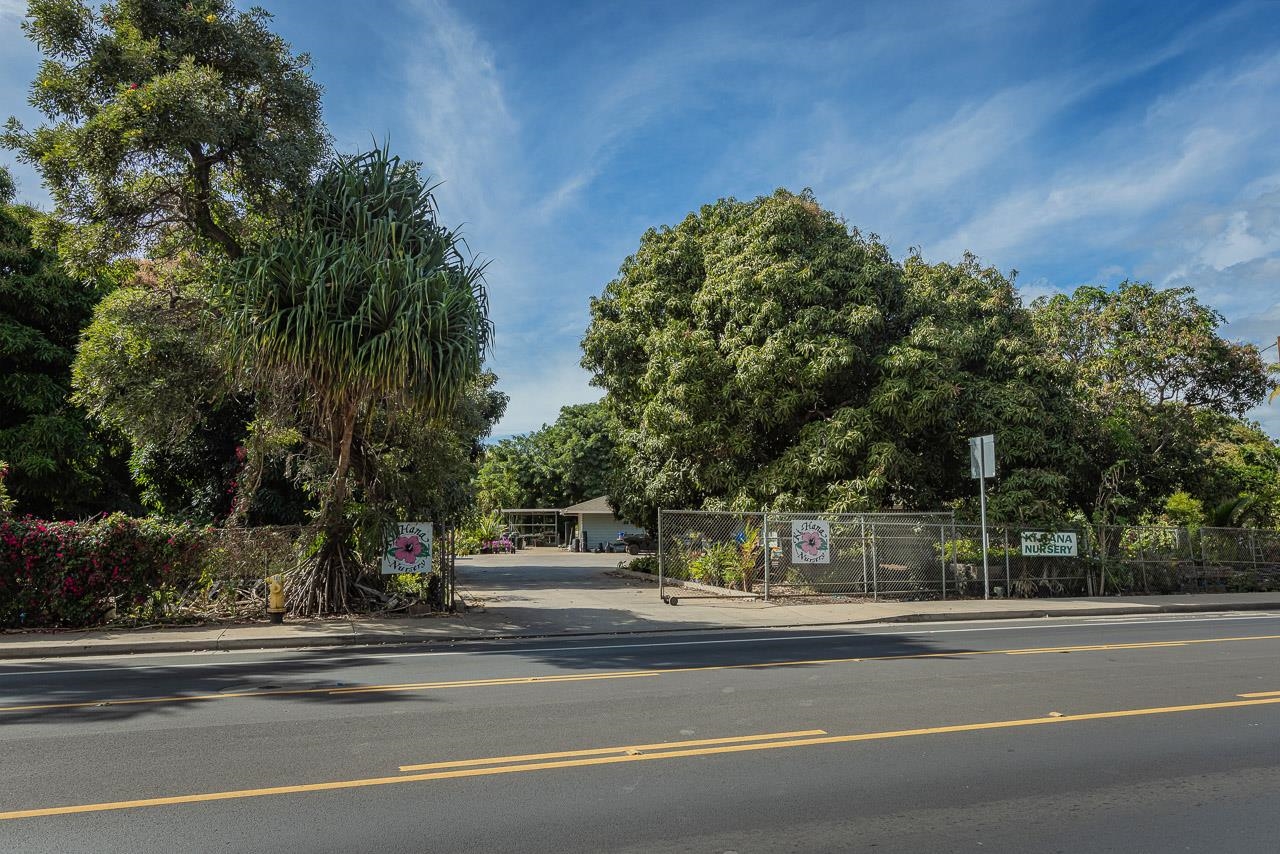 a view of a building ground and trees