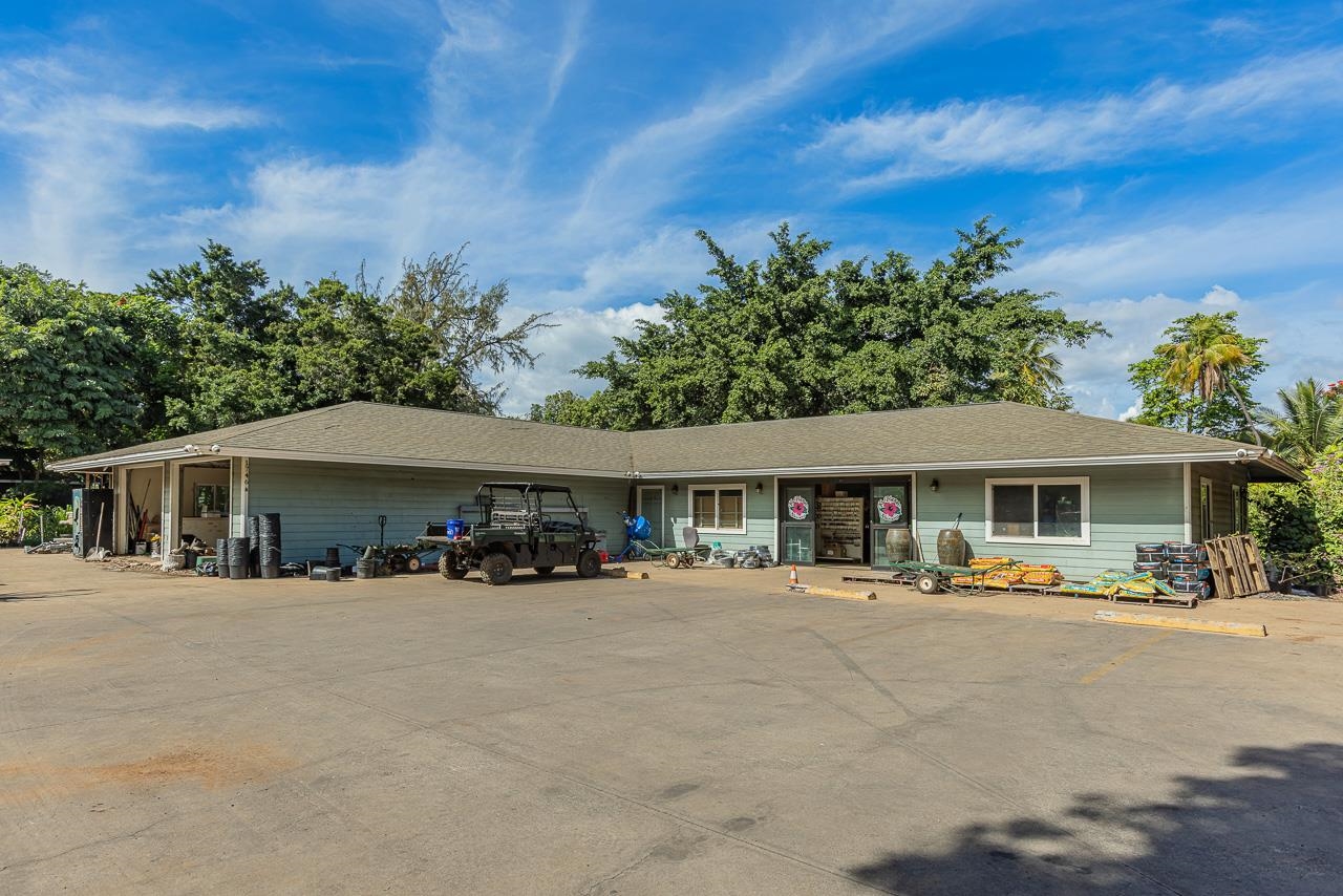 1746 South Kihei Road Kihei, HI 96753 - Photo 16 of 35 a front view of house with yard and trees in the background