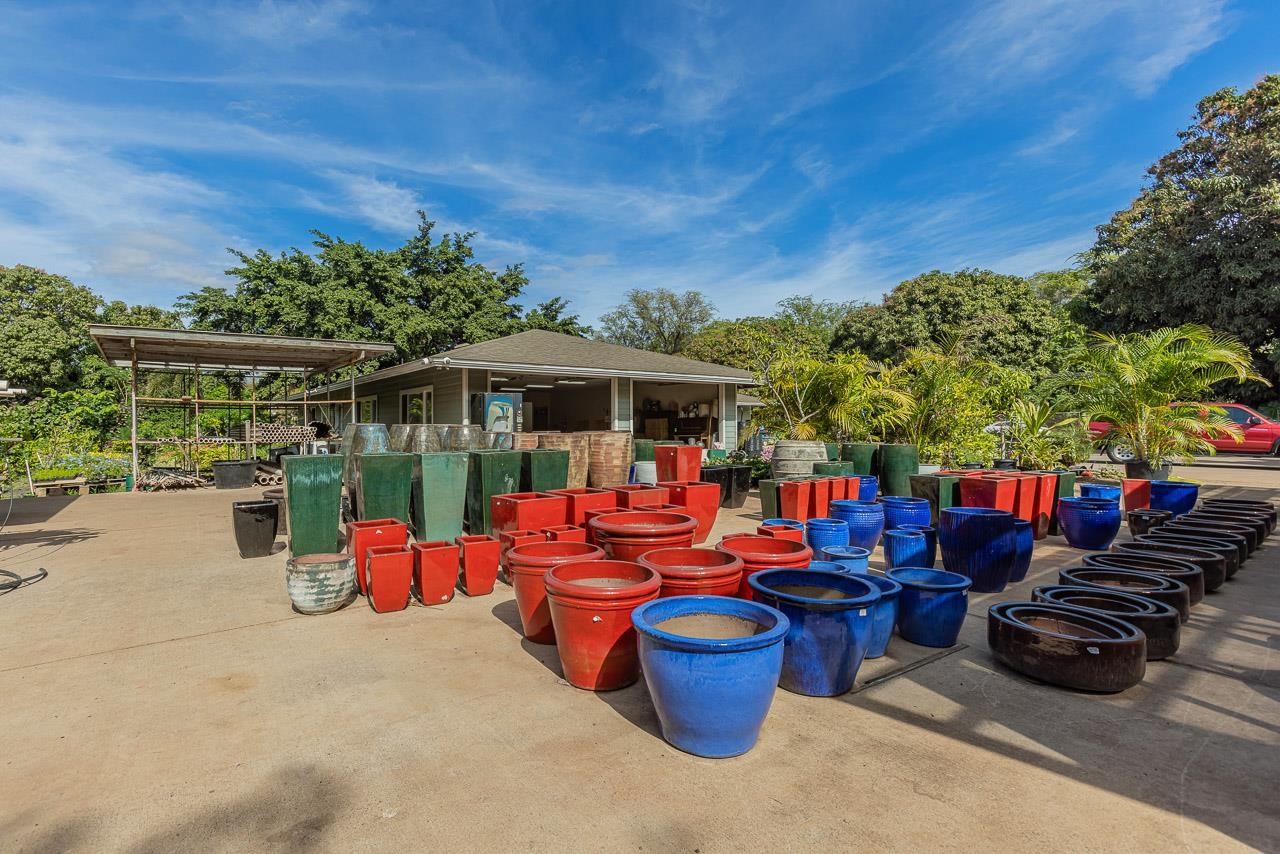 1746 South Kihei Road Kihei, HI 96753 - Photo 20 of 35 a view of a patio with chairs and plants