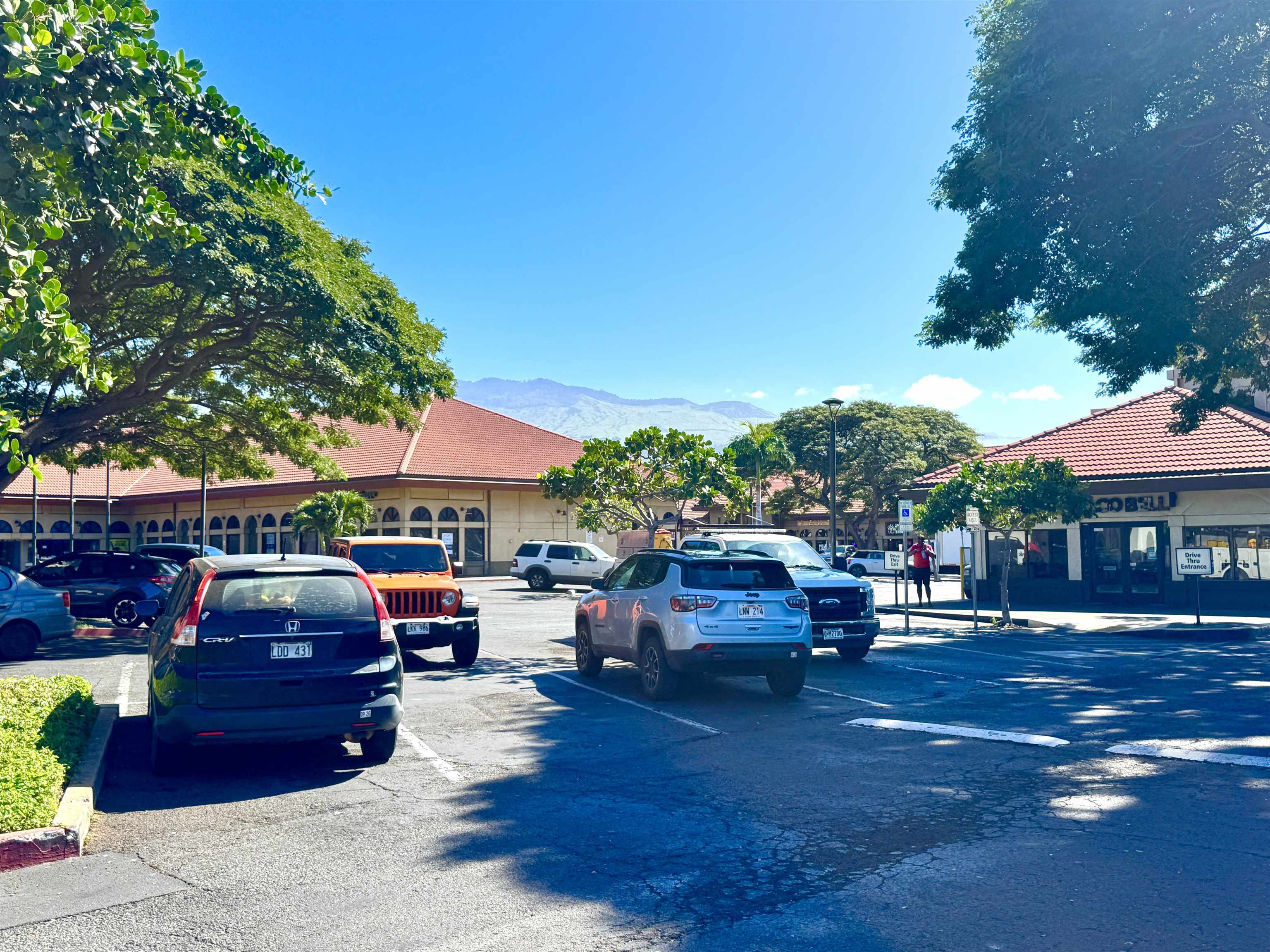 1746 South Kihei Road Kihei, HI 96753 - Photo 31 of 35 a cars parked in front of a building