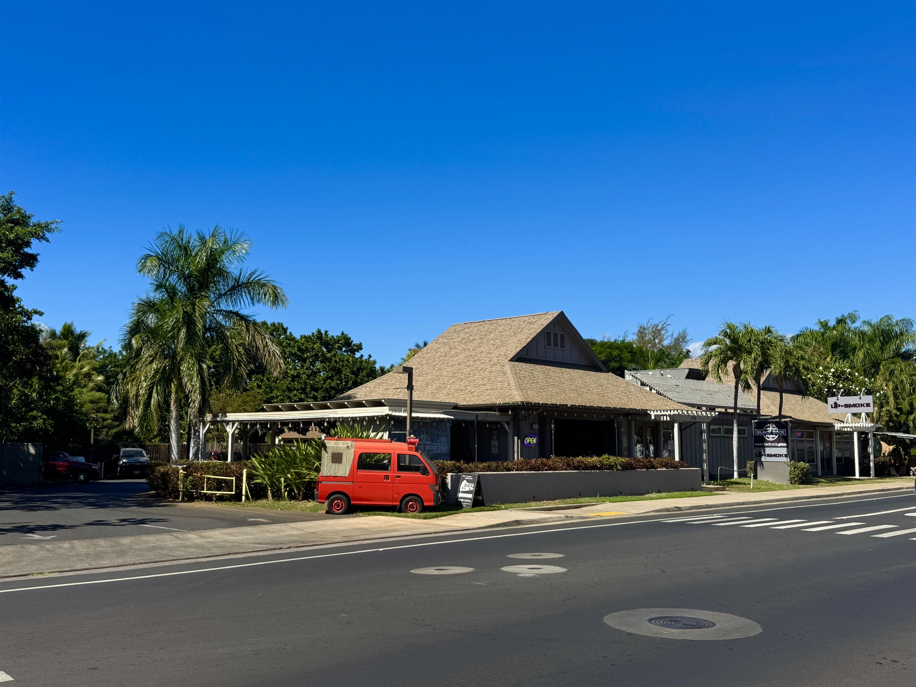 1746 South Kihei Road Kihei, HI 96753 - Photo 34 of 35 a couple of cars parked in front of a building