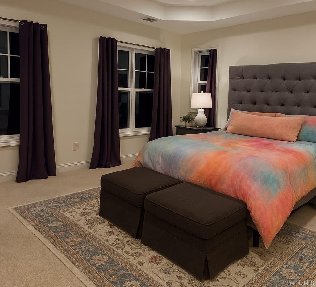 9 Lilac Lane Ridge, NY 11961 - Photo 7 of 9 a bedroom with bed and window