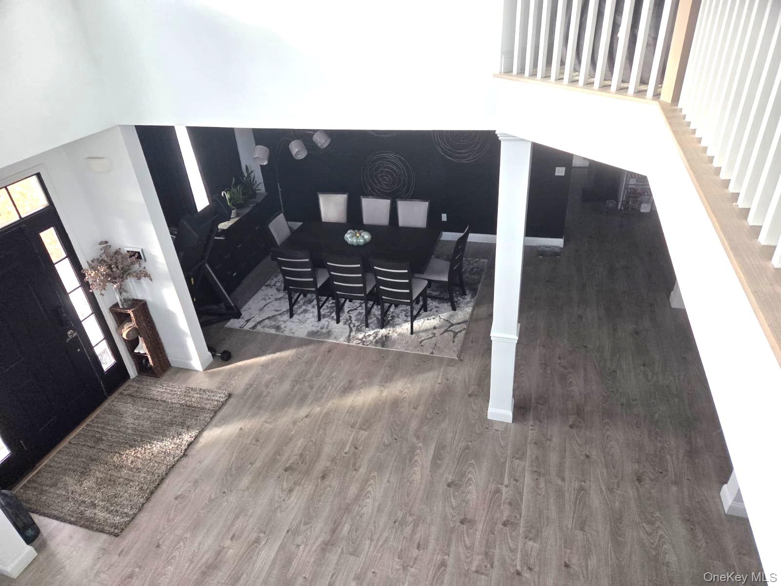 9 Lilac Lane Ridge, NY 11961 - Photo 8 of 9 a view of a livingroom with furniture and wooden floor