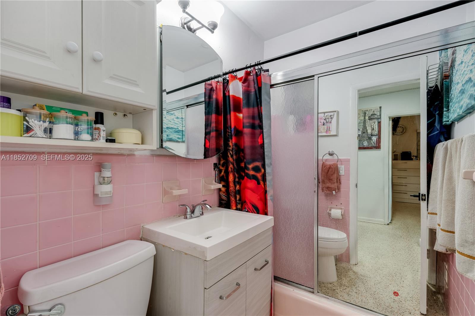 9311 Southwest 37th Street Miami, FL 33165 - Photo 11 of 39 a bathroom with a sink toilet and shower
