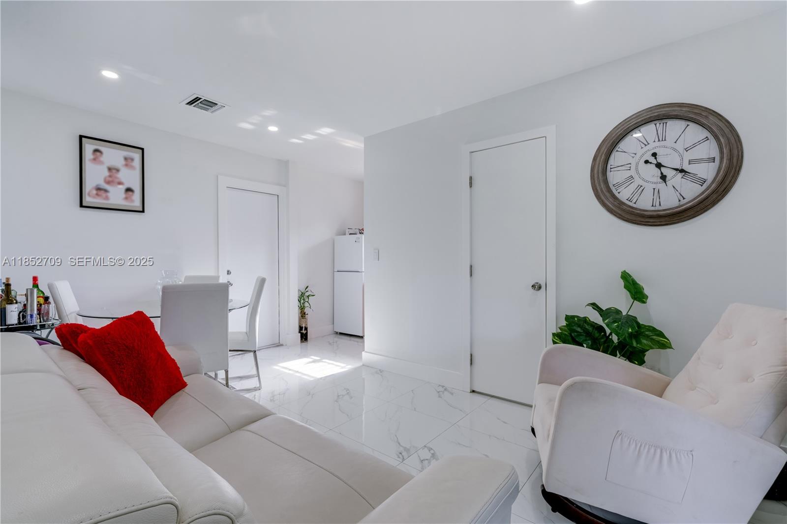 9311 Southwest 37th Street Miami, FL 33165 - Photo 22 of 39 a living room with furniture