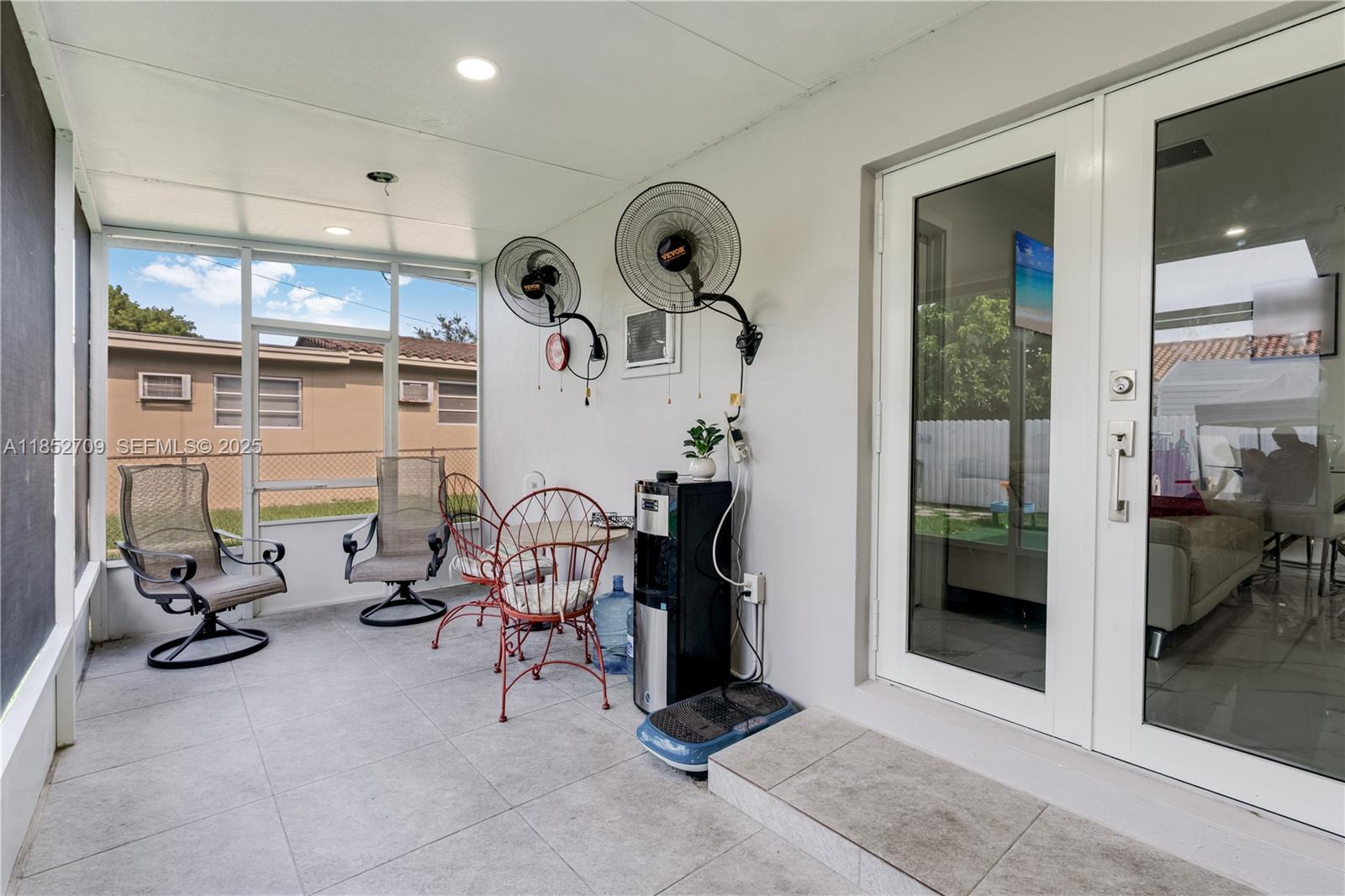9311 Southwest 37th Street Miami, FL 33165 - Photo 27 of 39 a view of a room with gym equipment