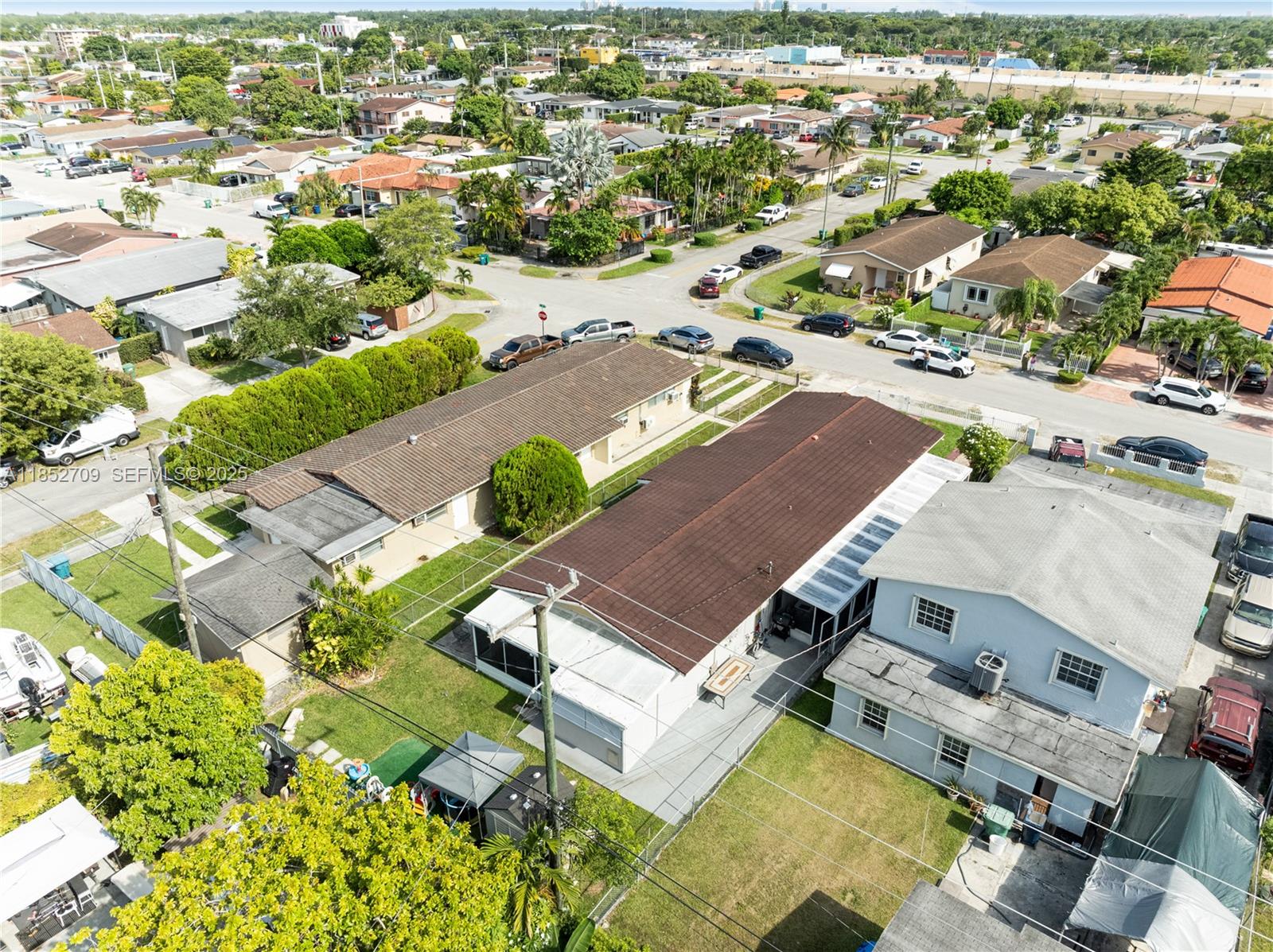 9311 Southwest 37th Street Miami, FL 33165 - Photo 34 of 39 an aerial view of residential houses with outdoor space