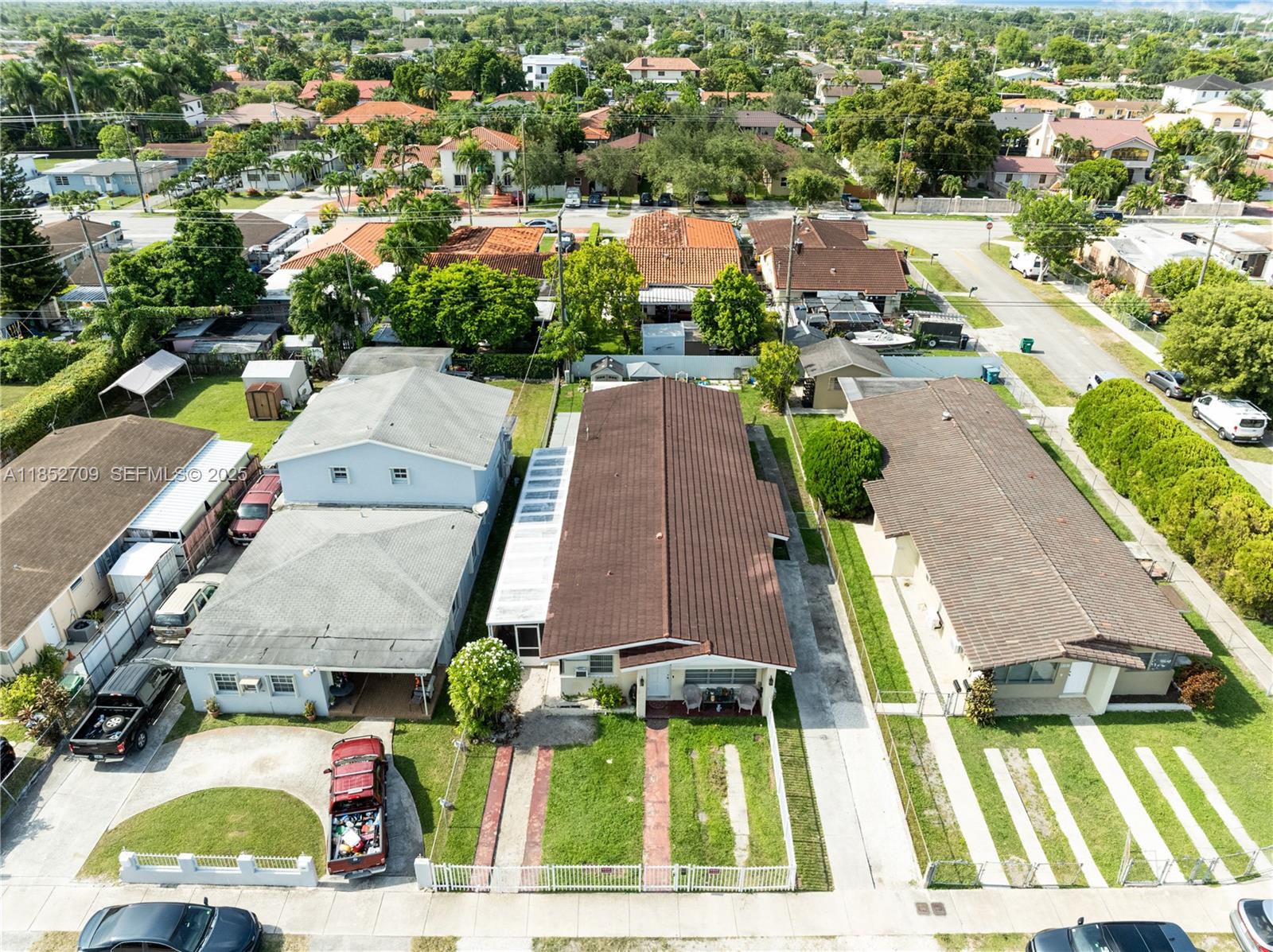 9311 Southwest 37th Street Miami, FL 33165 - Photo 38 of 39 an aerial view of residential houses with outdoor space and swimming pool