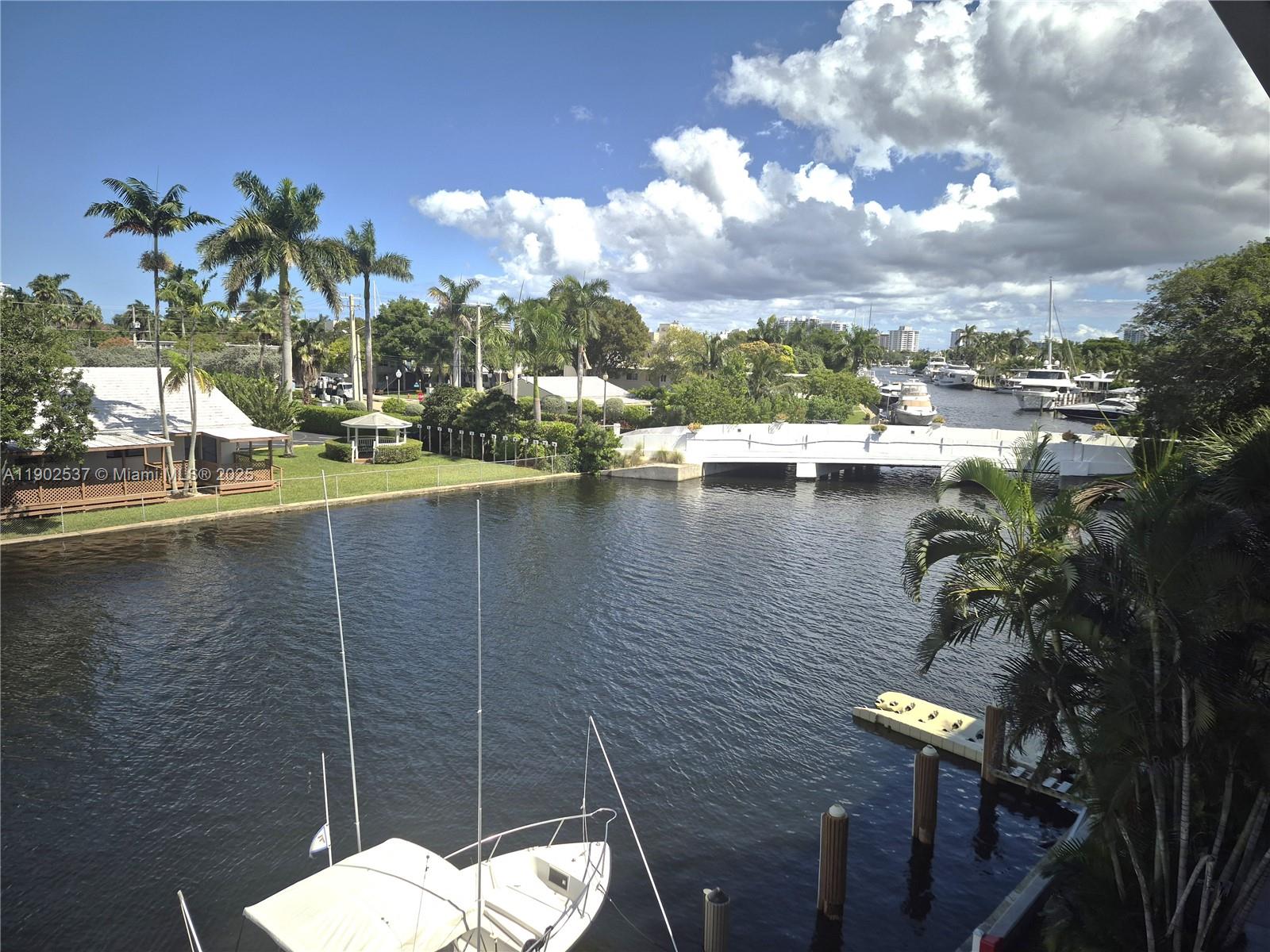535 Hendricks Isle, Unit 306 Fort Lauderdale, FL 33301 - Photo 1 of 32 a view of a lake from a balcony