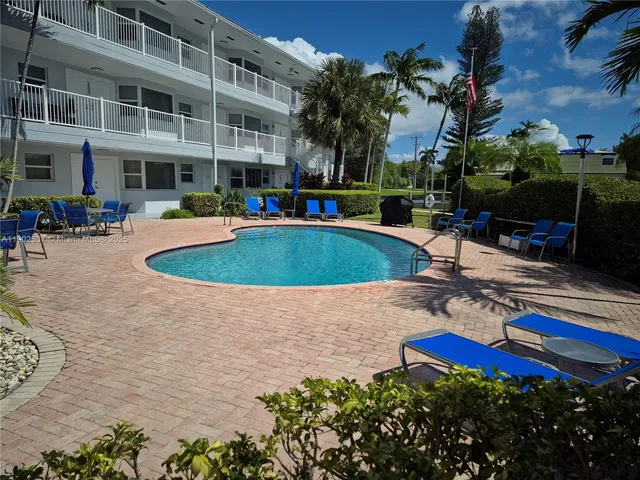 an outdoor space with furniture