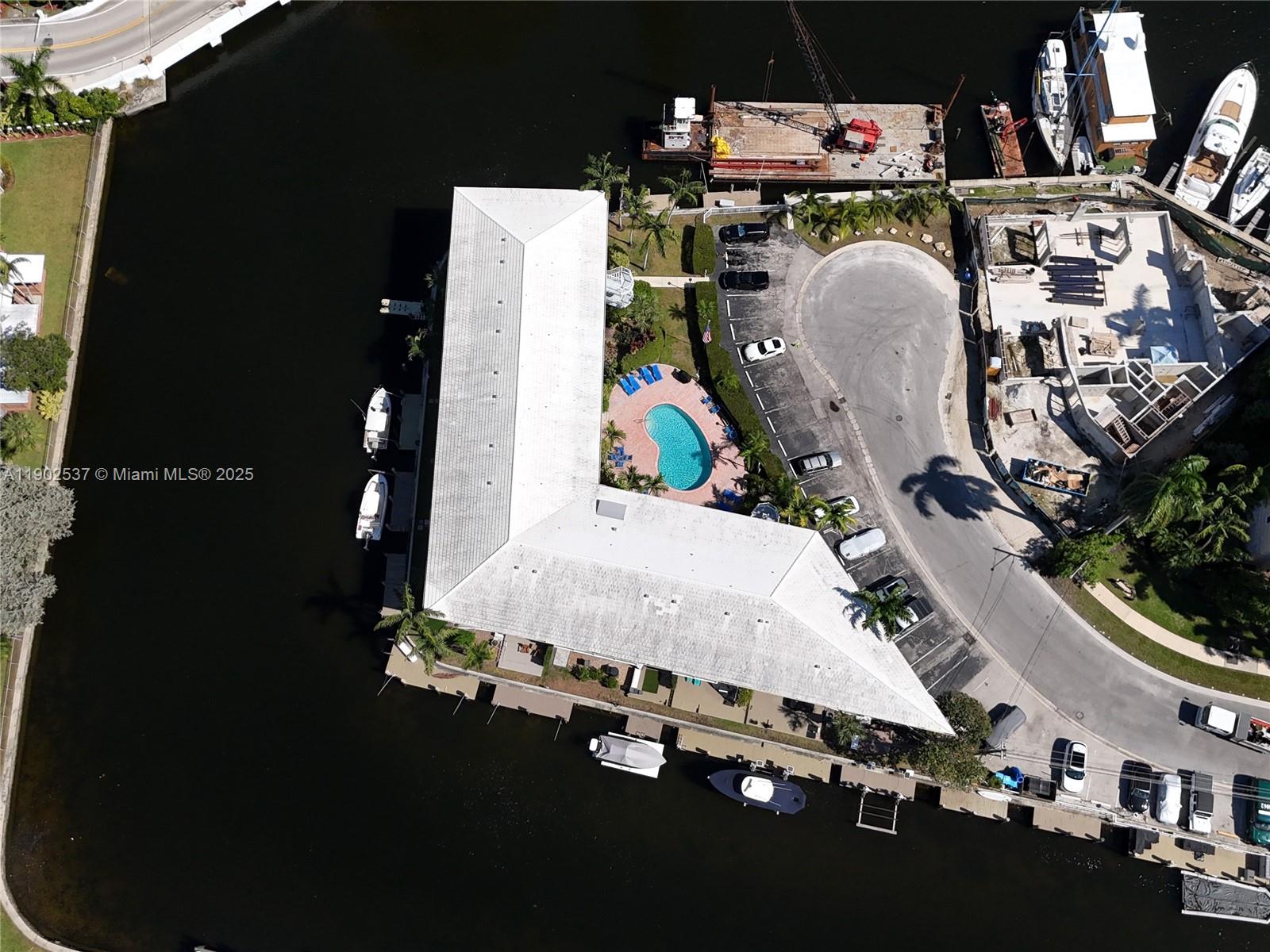 535 Hendricks Isle, Unit 306 Fort Lauderdale, FL 33301 - Photo 29 of 32 a bed room with a bed and toys