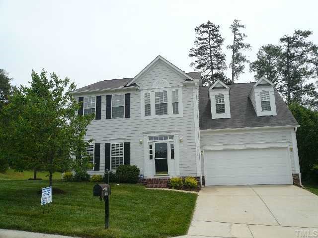 Great curb appeal with freshly painted exterior and mature landscaping!